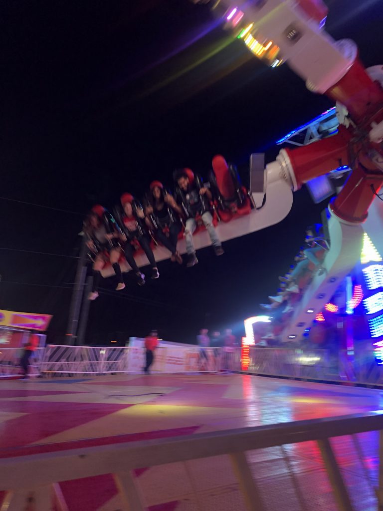 people on a Midway ride