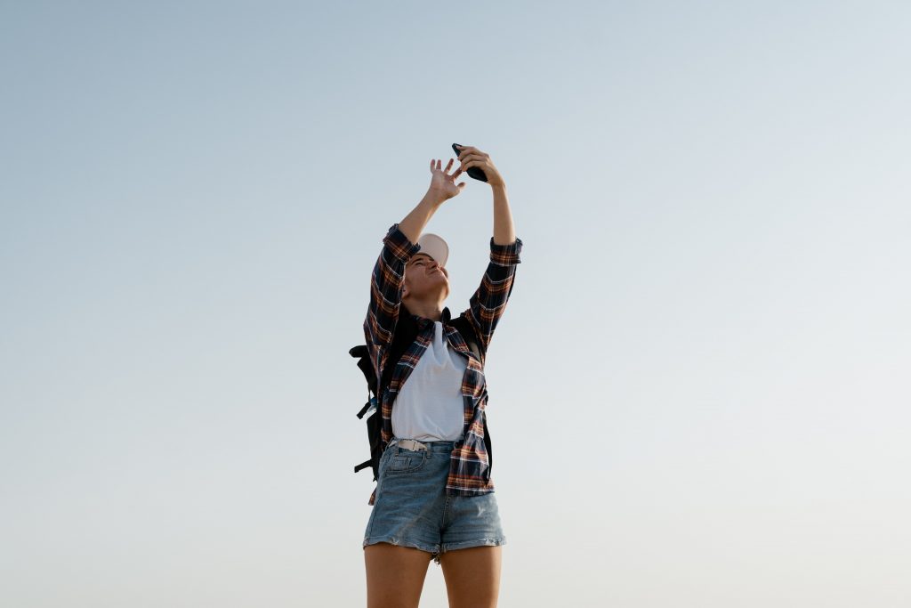 woman with phone outside